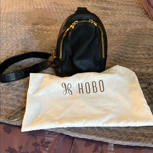 HOBO Black and Gold Leather Backpack with Structured Design